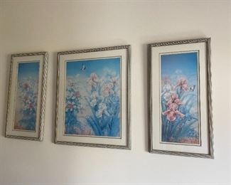 Set of three floral prints.