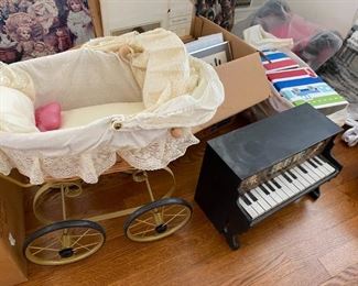 Vintage doll carriage and piano.
