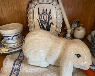 Ceramic bunny and blue and white dishes.