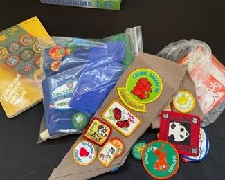 Girl Scout badges and accessories.
