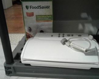 FOOD SAVER VACUUM AND BAGS
