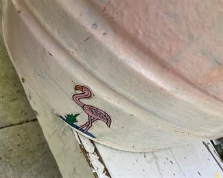 Giant aluminum tub painted pink, adorned with a flamingo, one flamingo, not a lawn full, but you could put a lawn full in it!