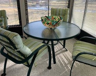 Outdoor furniture with cushions.