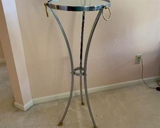 Glass and chrome plant stand.