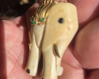 Emeralds, a ruby crown & 14K Elephant pendant...