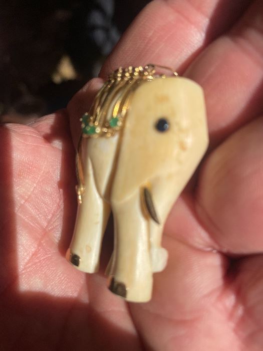 Emeralds, a ruby crown & 14K Elephant pendant...