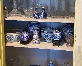 Large collection of blue and white and cut and pressed glass