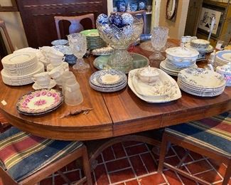 Empire dining table with pedestal base- can be round table without leaves. Also have 1 more leaf