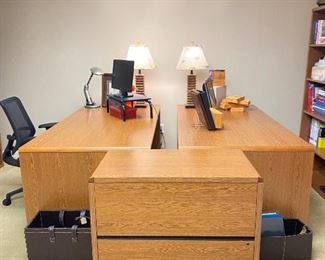 Beautiful Retro Hon office furniture. Picture shows desks facing each other. Smaller piece is a double file cabinet with 2 drawer.  Both desks have 6 drawers, 3 of which are filing cabinets as well. Cognac laminate oak wood. Although desks are heavy, they are modular and  easy to disassemble. Pristine condition and perfect for home office.