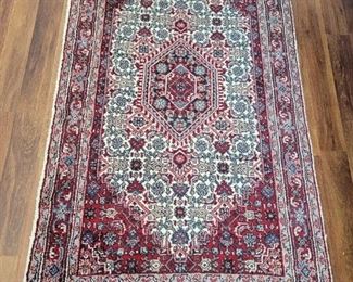 Hand woven small rug