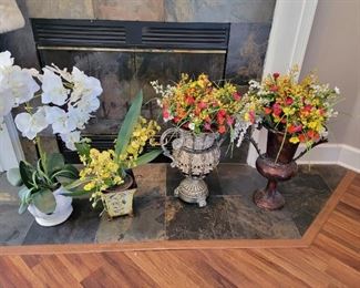 Floral arrangements in urn vases