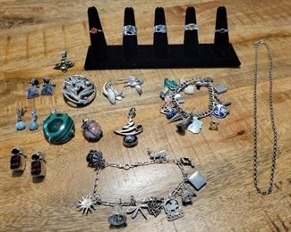 Sterling silver jewelry, vintage charm bracelets, art signed 