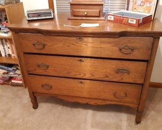 Antique chest of drawers, first bedroom on the left.