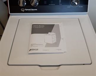 SPEED QUEEN WASHING MACHINE!!!! Laundry room is through the kitchen, next to the garage door.