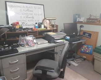 Steel desk, basement office.