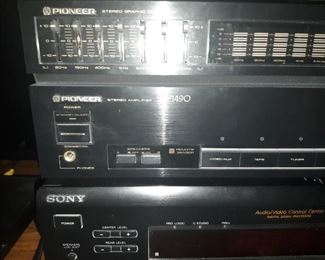 Pioneer stereo, without speakers. Basement family room. Also a Sony Home Theater receiver that comes with two shelf speakers.
