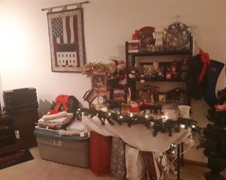 Loads of Christmas wrapping, and some other Christmas items in the basement family room.