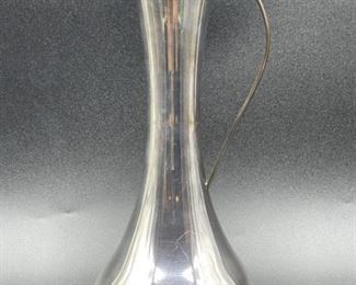 MID CENTURY STERLING SILVER PITCHER 158 G

MID CENTURY STERLING SILVER PITCHER
-158 GRAMS
-8" X 3" APPROX
-VERY GOOD OVERALL CONDITION,
-DP22522