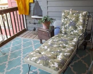 wrought iron chaise, weathervane, raingear