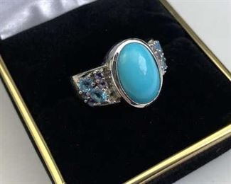  925 Silver & Turquoise Colored Center Piece Ring. Marked and jeweler tested. Comes in a size 8