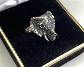  925 Silver Elephant Ring w/ Sapphire Eyes. Marked and jeweler tested. Comes in a size 8