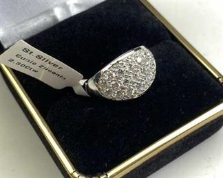  925 Silver & Pave Cubic Zirconia Ring in Box. Marked and jeweler tested. Comes in a size 7.5