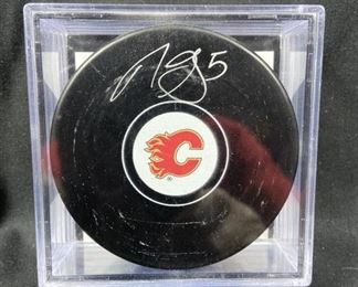  Autographed Calgary Flames Hockey Puck, Mark Giordano.,encased with AJ Sportsworld COA.  He now plays for the Seattle Kraken.  Giordano is known for his Olympic Team- and World Cup-worthy defensive talent,