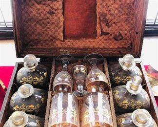 Antique 17 piece mid 19th C. Tantalus set. All the bottles are in perfect condition and are hand blown etched and gilded glass.