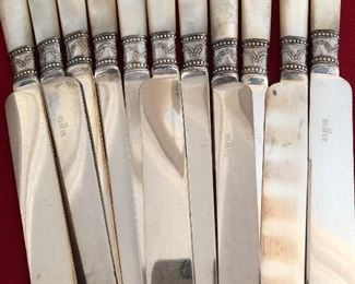 Set of 11 dinner knives with sterling bands