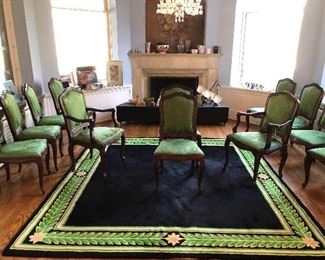 Set of 10 silk covered walnut dining rooms chairs chairs on a V’oske wool rug