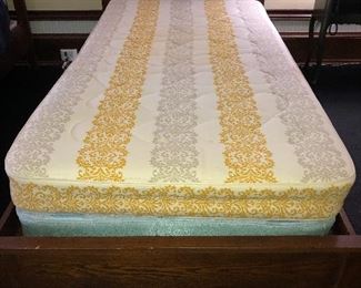 One of a pair of Mission Oak twin beds original to the 1918 house