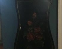 Clock on top and shelves behind the door