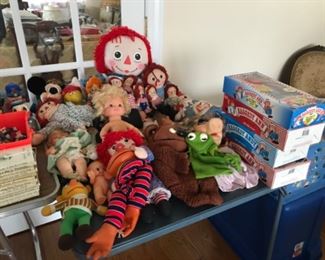 Raggedy Ann, muppets Sesame Street and other dolls