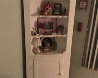 Corner display. Height 6‘2“, width 30”, depth 22”. Items on shelves sold separately.