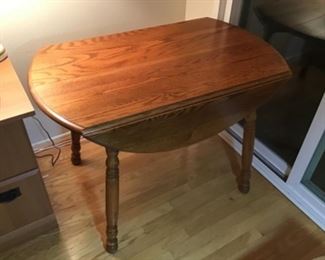 42 inches long by 25 inches, with leaves folded