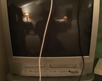 Old TV, with built-in VHS and DVD players. 