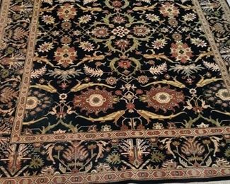 Several Wool Area Rugs.