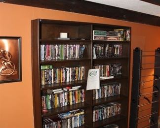 Shelves full of DVD, HD and blue ray movies and CD'S and some VHS