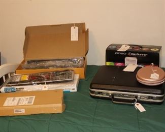 Misc keyboards (also one for editing) a DVD painter and vintage briefcase
