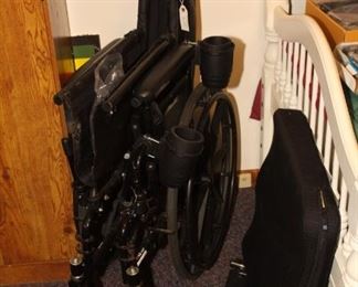 wheelchair with extra attachments