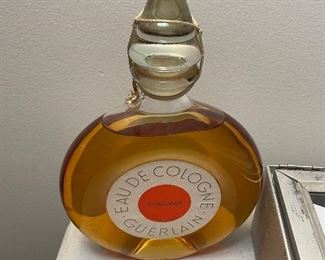 Sealed Shalimar Eau de cologne.  Oversized bottle, about 16 oz.