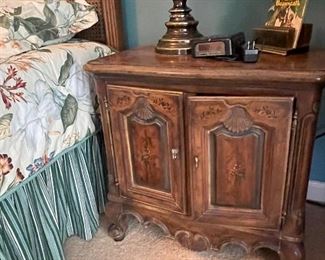 One of two bedside cabinets by Heritage