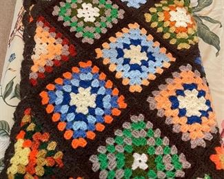 Granny square crocheted afghan