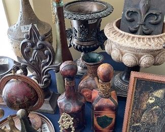 Urns, leather covered bottles