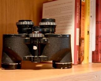 vintage binoculars, books