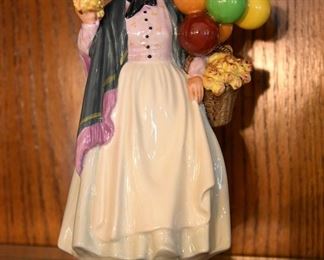 figurine by Royal Doulton, "Biddy Pennyfarthing", made in England