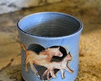 earthenware horses on heart votive