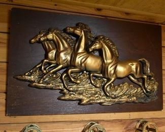 horse relief on wood background