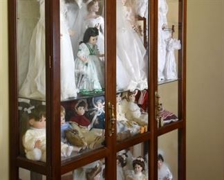 display case, dolls, lots and lots of dolls!