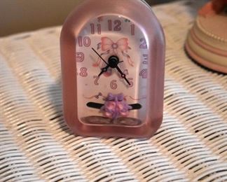 small pink clock